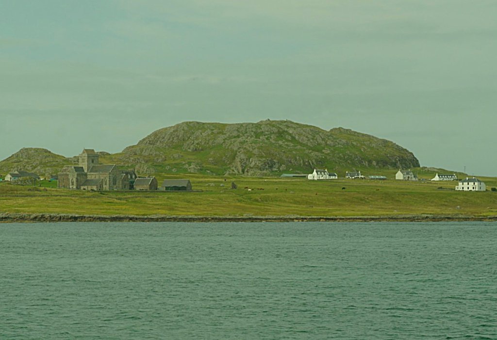 Iona Abbey, from the ferry. Dun I behind. First impression of the island of Iona