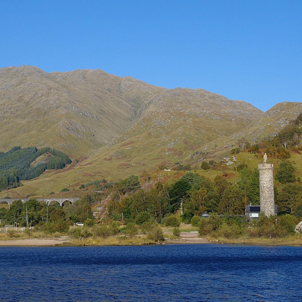 The famous Glenfinnan Monument (right) from the waters of Loch Shiel The famous Glenfinnan Monument (right) from the waters of Loch Shiel