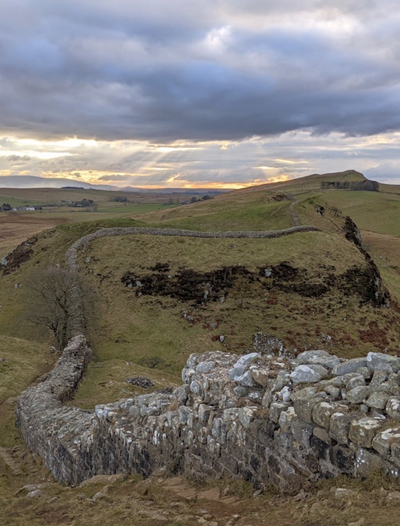 Walking Hadrian's Wall and looking down on 'Sycamore Gap'.